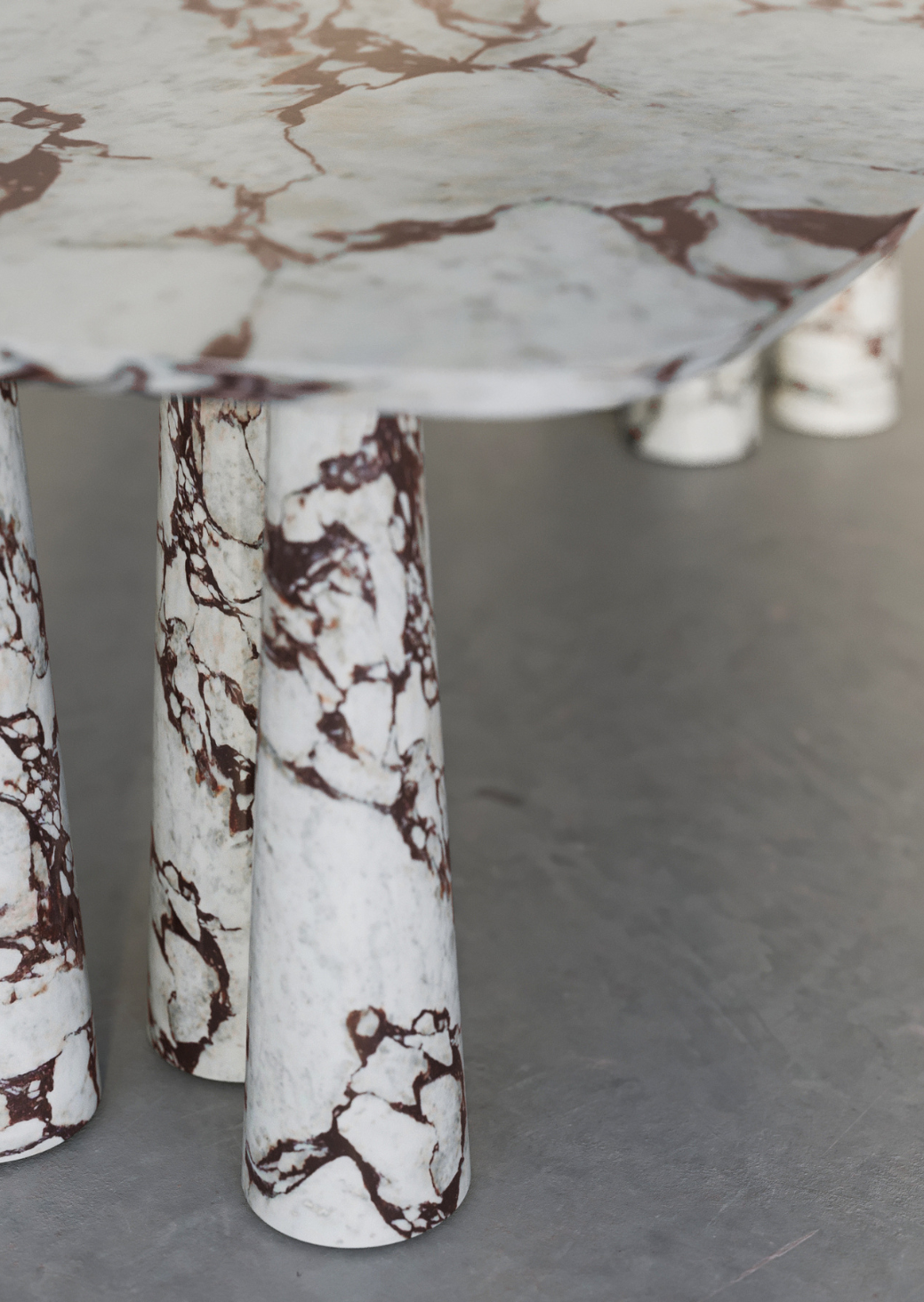 Bold Table limited edition mid-century inspired collectible dining table in marble

Bold Table six tapered legs close-up, handcrafted in Australia