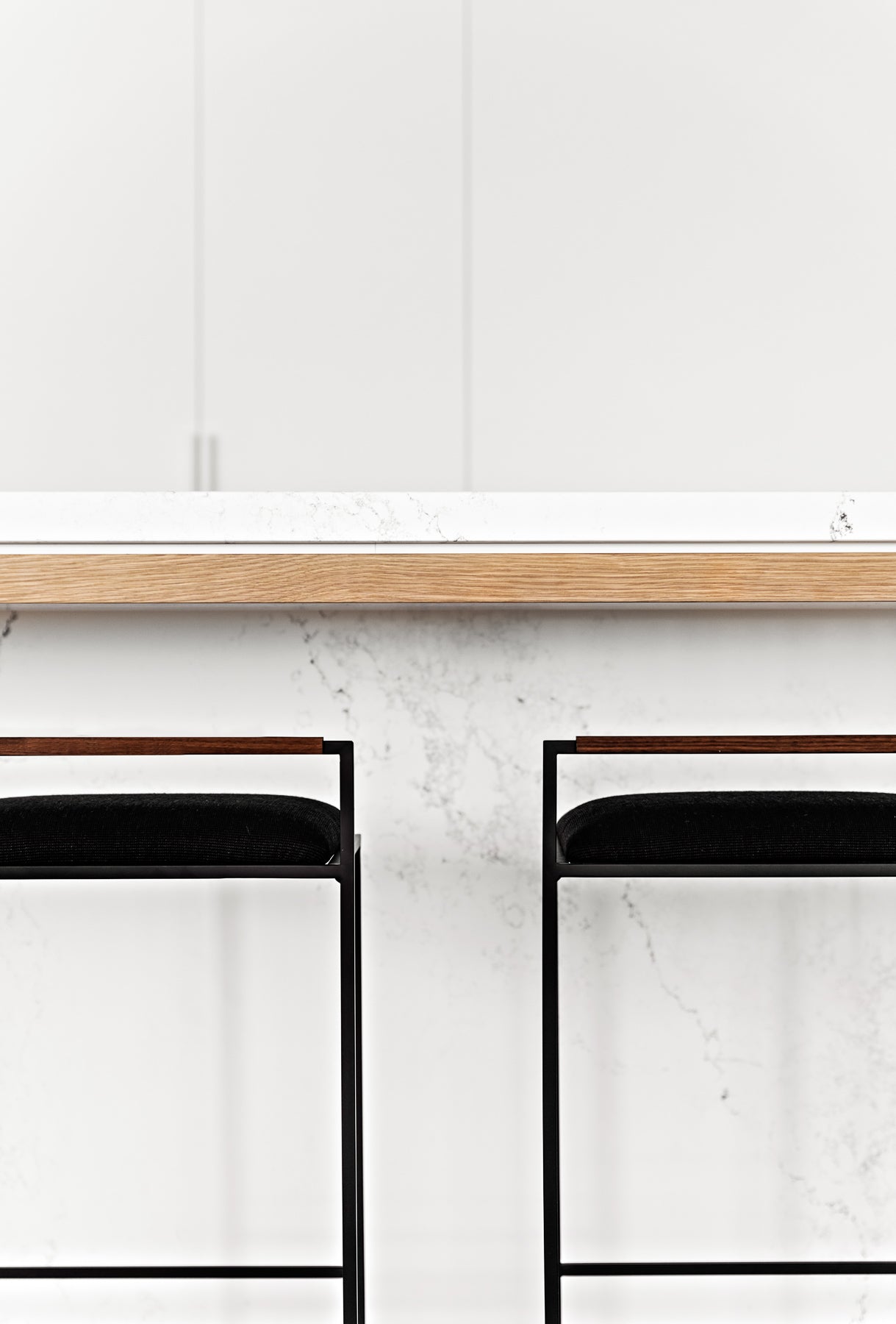 Kolsai Stool close-up of walnut backrest  with black matt powder coat