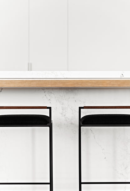 Kolsai Stool close-up of walnut backrest  with black matt powder coat