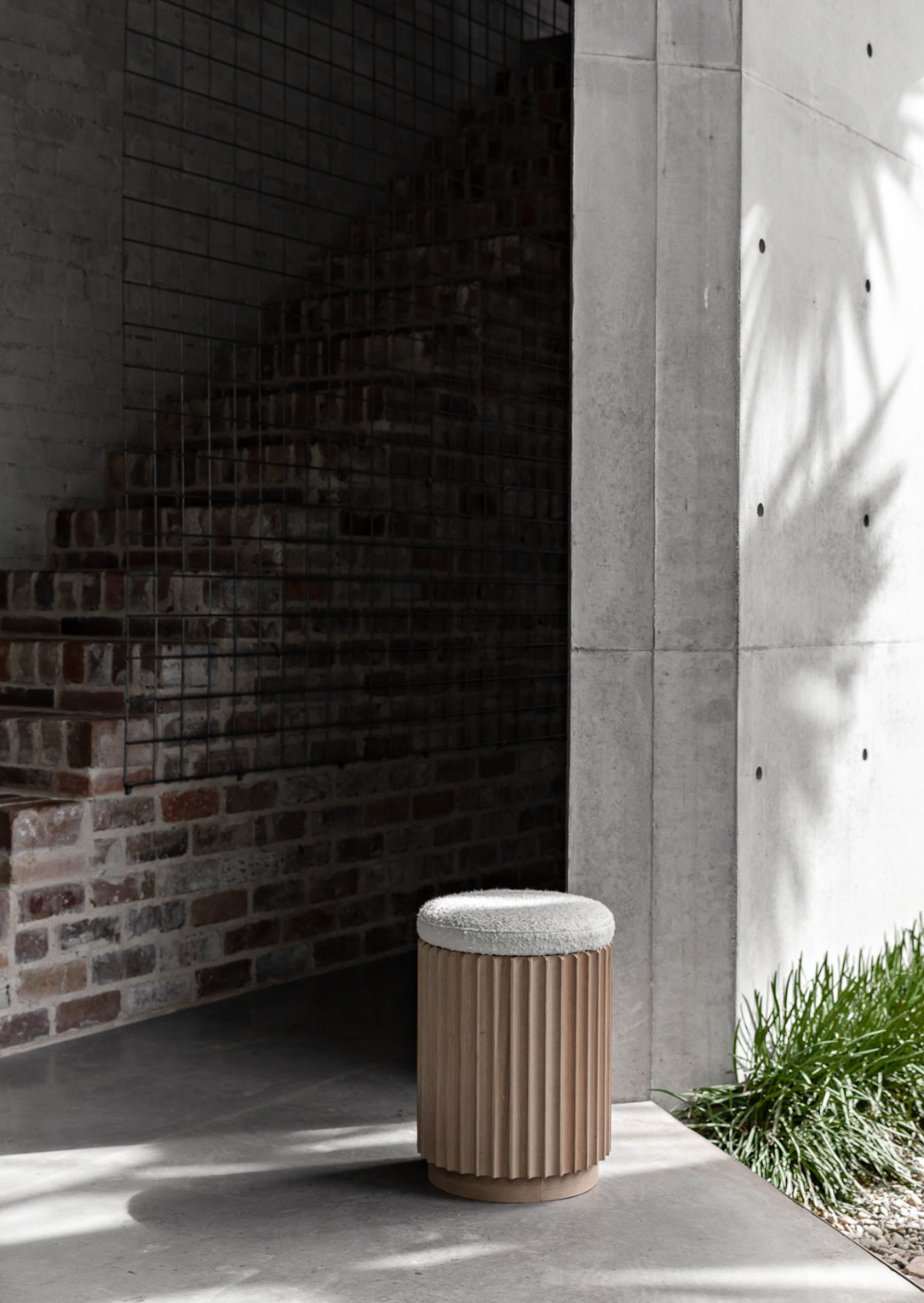 Underline Stool – sculptural side table in American Oak with boucle top