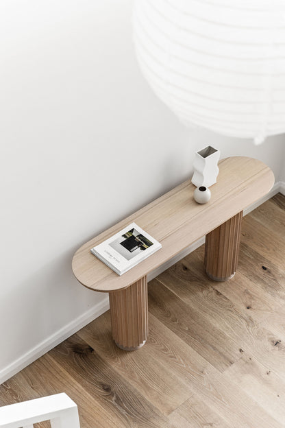 Underline Console – sculptural console table in American Oak with hollow timber bases
