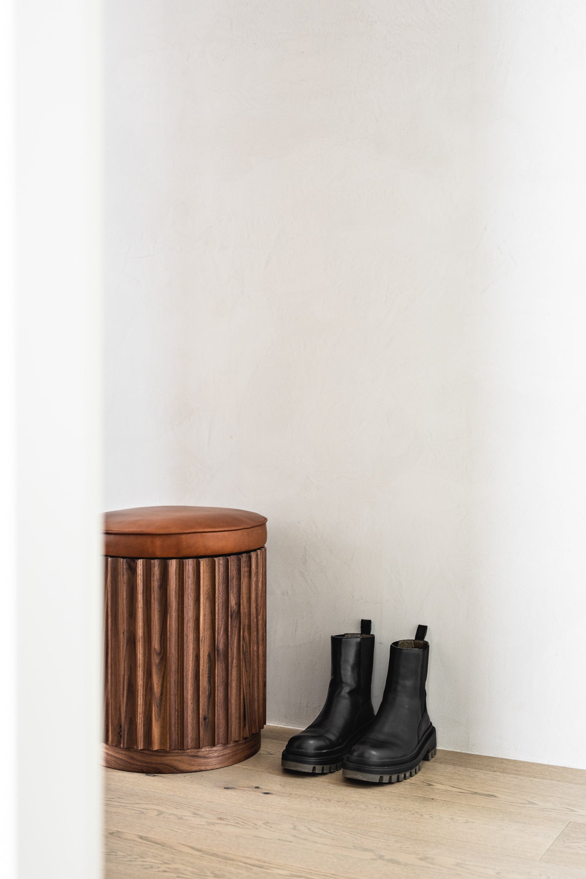 Underline Stool – sculptural side table in American Oak with leather top